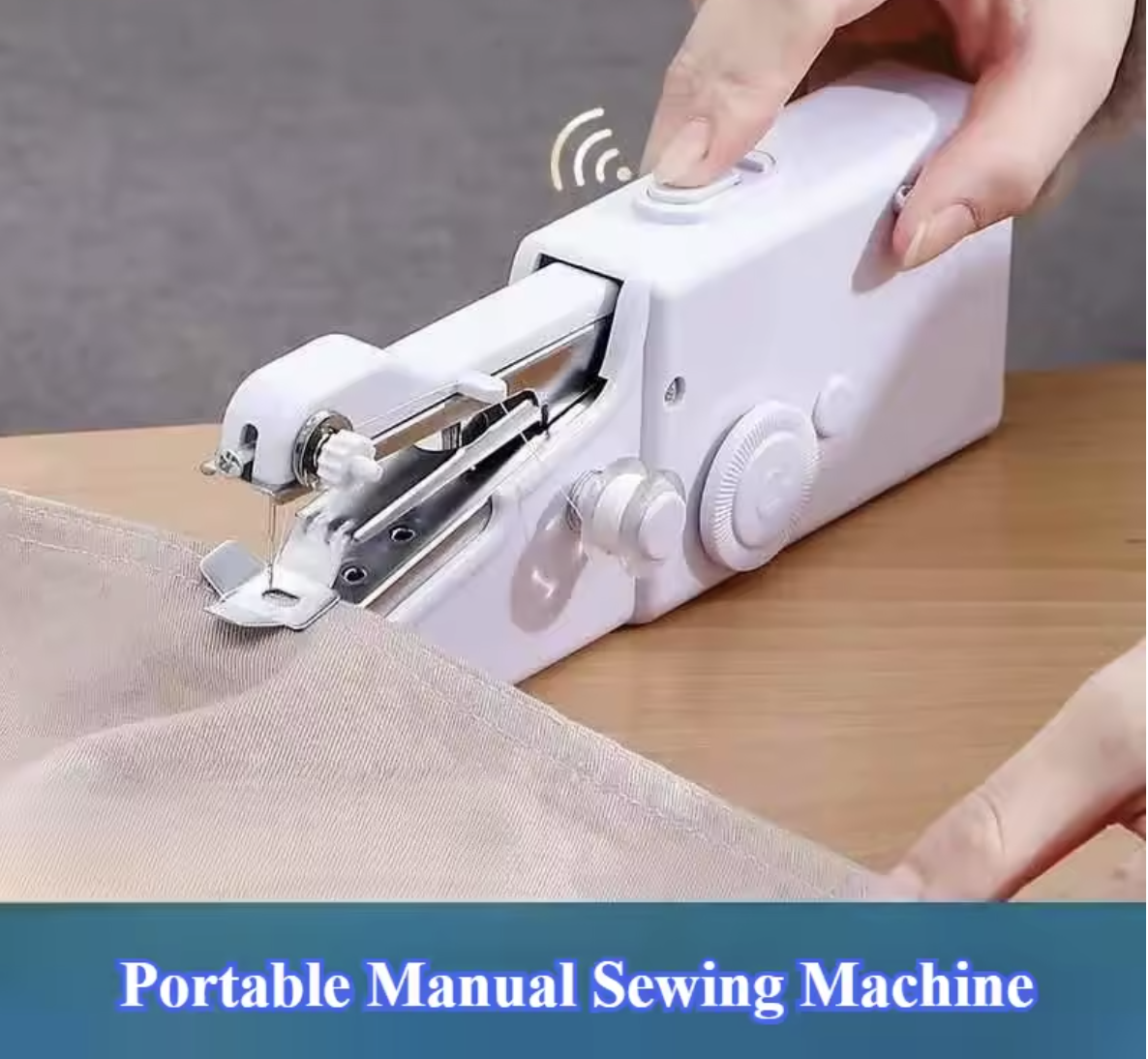 Handheld mini sewing machine stitching fabric